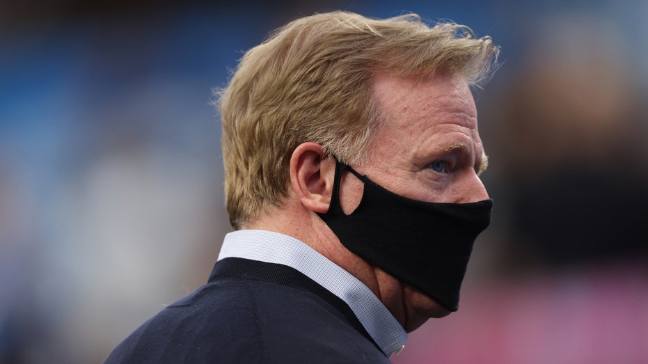 NFL commissioner Roger Goodell wears a protective face covering due to the Covid-19 pandemic before the Las Vegas Raiders play against the Los Angeles Chargers at SoFi Stadium on October 4, 2021 in Inglewood, California. (Photo by Harry How/Getty Images)