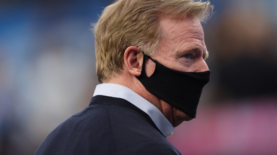 NFL commissioner Roger Goodell wears a protective face covering due to the Covid-19 pandemic before the Las Vegas Raiders play against the Los Angeles Chargers at SoFi Stadium on October 4, 2021 in Inglewood, California. (Photo by Harry How/Getty Images)