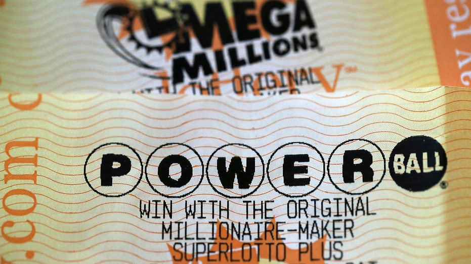 Brightly colored yellow and orange Powerball and Mega Millions lottery tickets