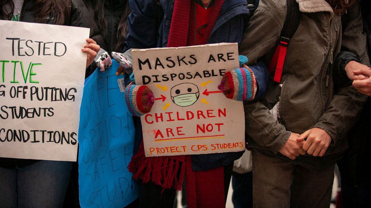 As omicron fuels surge, U.S. students stage walkouts to protest in ...