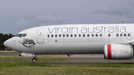 Virgin Australia to cut capacity by 25% as COVID-19 cases rise