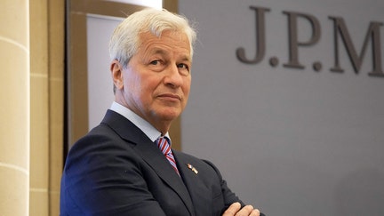 JP Morgan CEO Jamie Dimon looks on during the inauguration of the new French headquarters of US' JP Morgan bank on June 29, 2021 in Paris. - American bank JP Morgan's new trading floor is the latest example of how Brexit is changing Europe's financial landscape since January. 