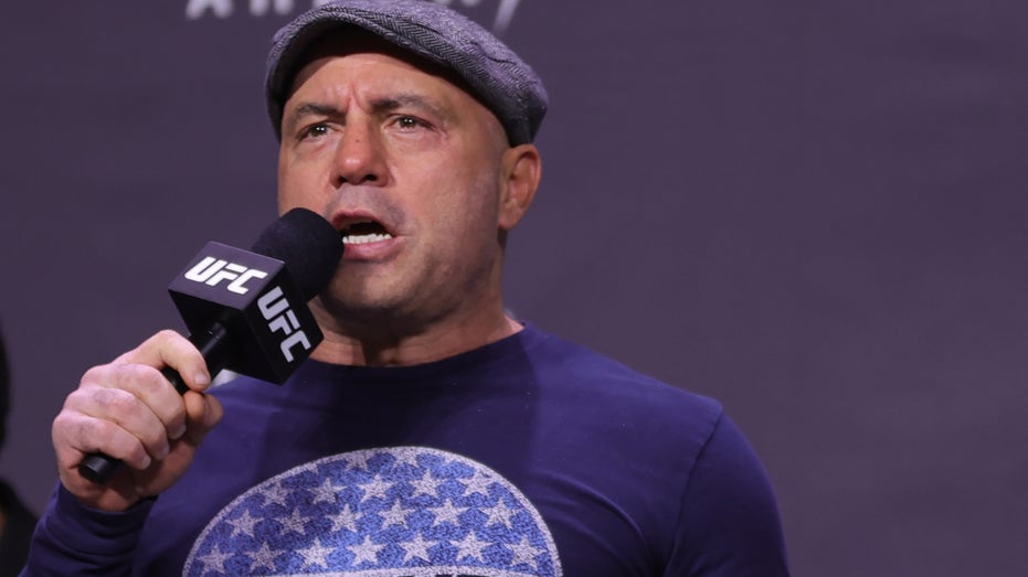 Joe Rogan introduces fighters during the UFC 269 ceremonial weigh-in at MGM Grand Garden Arena on Dec. 10, 2021, in Las Vegas, Nevada.