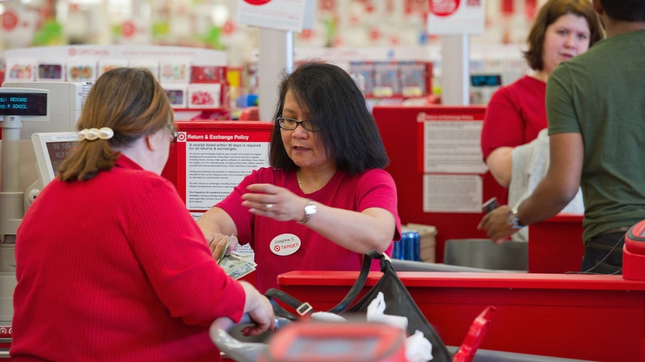 A woman checks out while shopping at Target