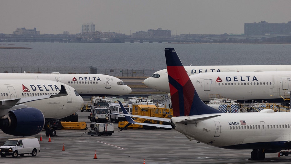 Delta Airlines passenger aircraft on the tarmac of John F. Kennedy International Airport in New York, on Dec. 24, 2021. 