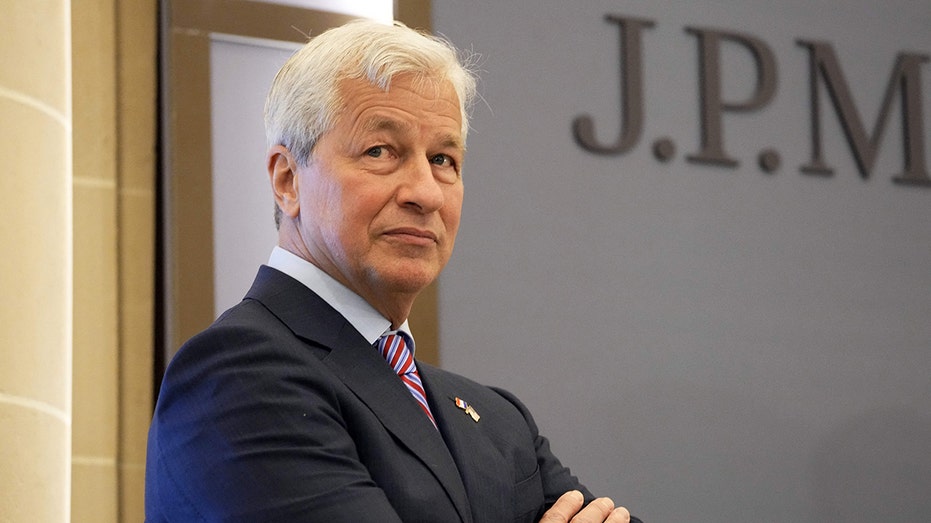 Jamie Dimon JP Morgan opinionated down a JP Morgan logo