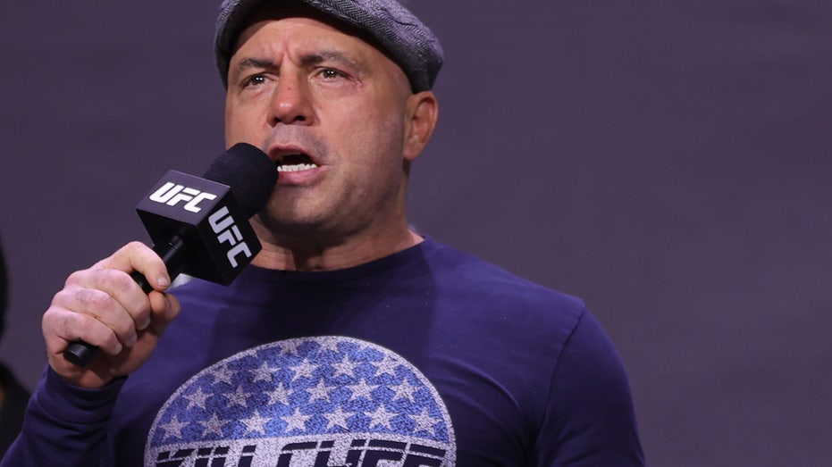 Joe Rogan introduces fighters during the UFC 269 ceremonial weigh-in at MGM Grand Garden Arena on December 10, 2021 in Las Vegas, Nevada. (Photo by Carmen Mandato/Getty Images)