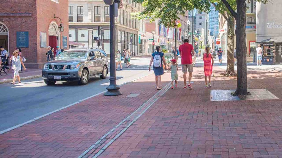 family walking in Boston