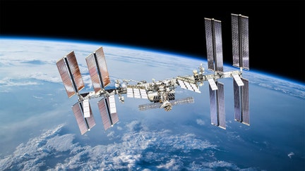 International space station with astronauts. Elements of this image furnished by NASA (url:https://www.nasa.gov/sites/default/files/thumbnails/image/iss060e007297.jpg https://www.nasa.gov/sites/default/files/thumbnails/image/44911459904_375bc02163_k.jpg)
