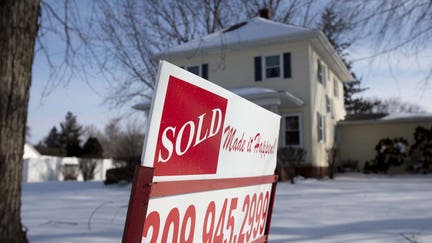 A "Sold" sign stands outside a home following a snow fall in Geneseo, Illinois, U.S., on Monday, Jan. 20, 2020. The National Association Of Realtors is scheduled to release Existing Homes Sales figures on January 22. Photographer: Daniel Acker/Bloomberg via Getty Images - Fox Business News