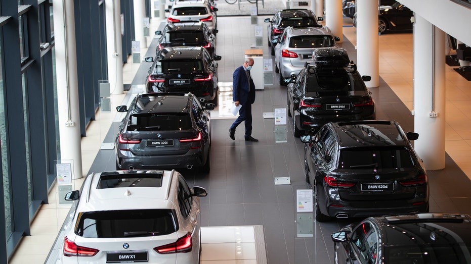 BMWs in a showroom