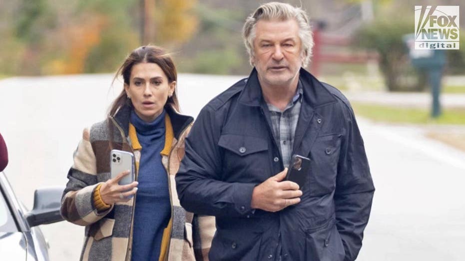 Alec Baldwin and his wife Hilaria stopped to talk to photographers in Vermont. The actor revealed he had been speaking to the police every day regarding the ongoing investigation.