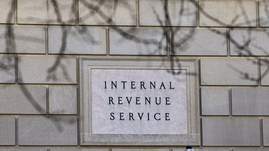 Signage outside the Internal Revenue Service (IRS) headquarters in Washington, D.C., U.S., on Friday, March 19, 2021. The IRS is delaying the April 15 tax-filing deadline to May 17, giving taxpayers an additional month to file returns and pay any outstanding levies. Photographer: Samuel Corum/Bloomberg