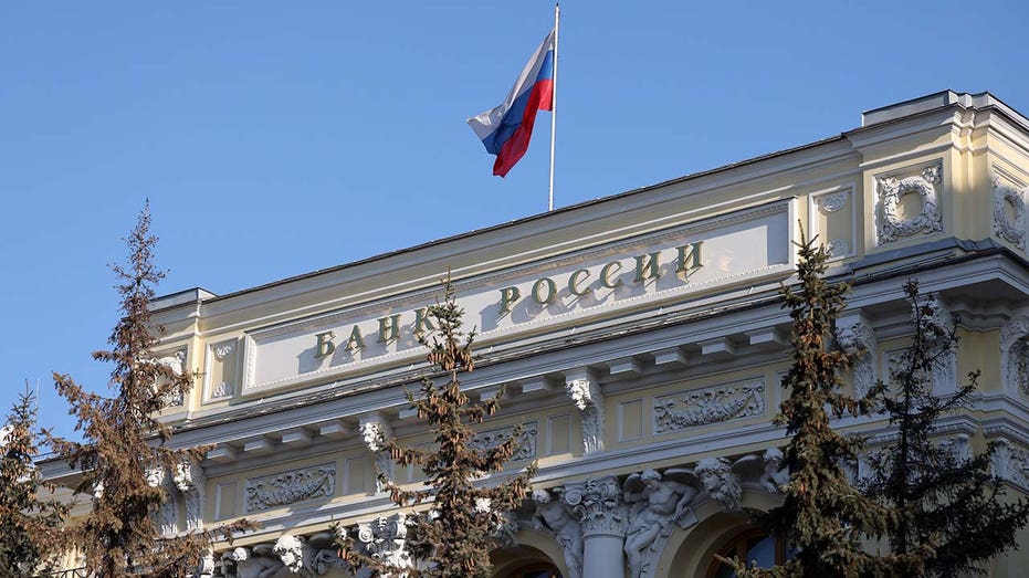 Russian flag flying over Bank Rossii in Moscow