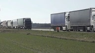 Ukrainian anti-war activists at Poland-Belarus border stop trucks in effort to halt trade with Russia