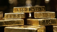 Gold rises amid haven demand but outlook appears bearish
