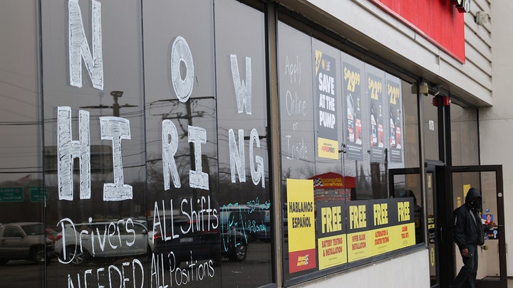 Jobs surge more than expected despite Fed's war on inflation