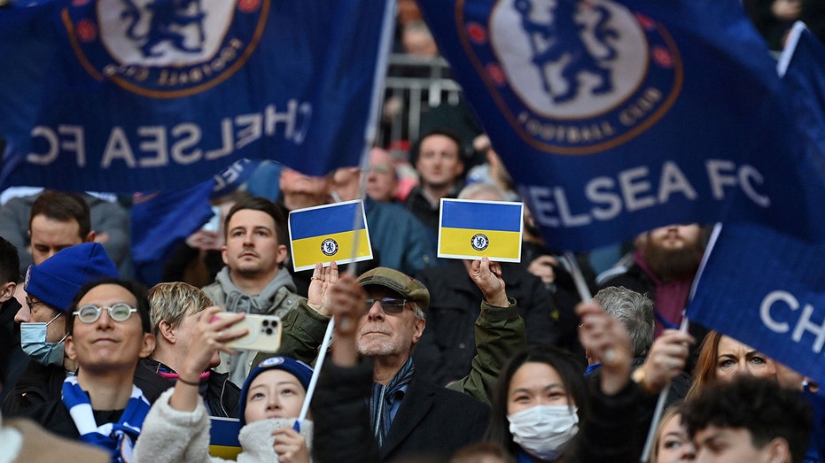 Chelsea supporters wave Ukraine flags at Wembley Stadium