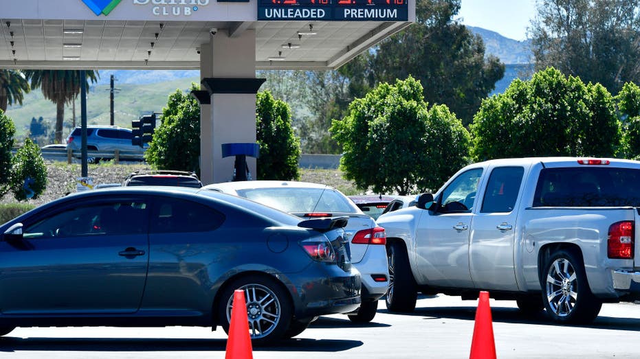 Motorists wait in long lines for gas Tuesday