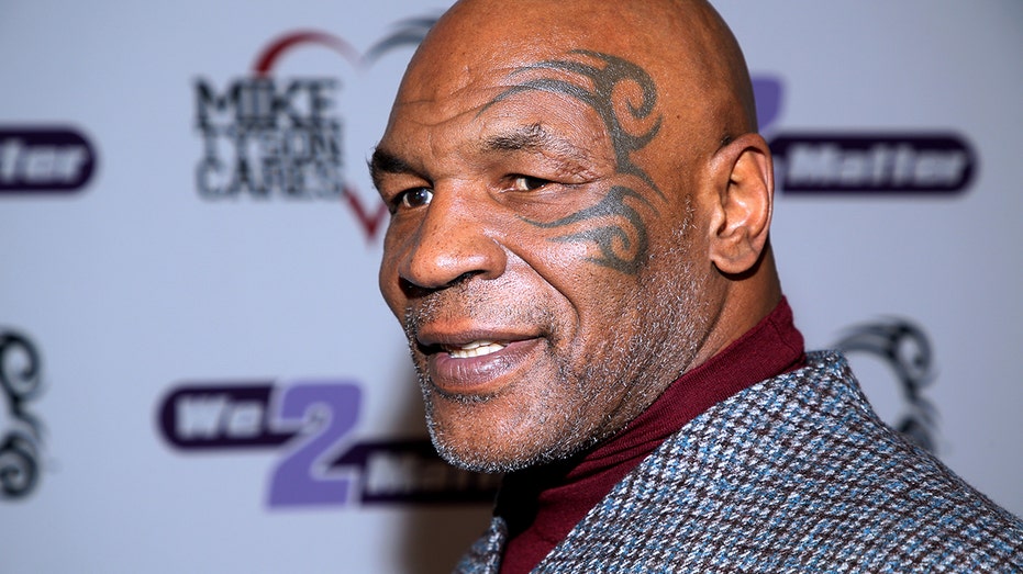 Mike Tyson throws punches at unruly passenger on JetBlue flight: report |  Fox Business