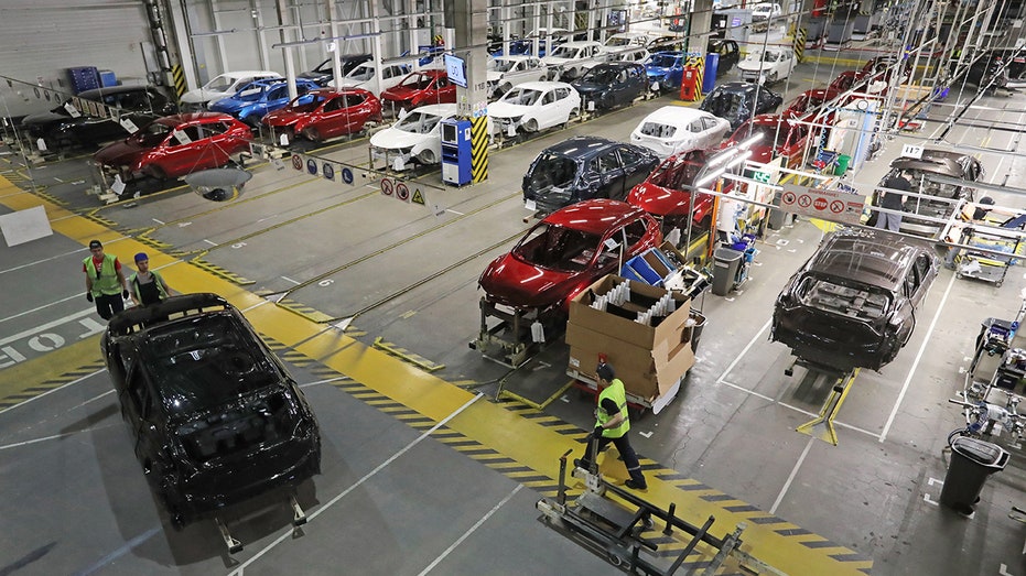 Nissan vehicles in a factory