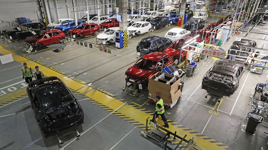 Nissan vehicles in a factory