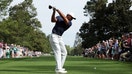 Tiger Woods of the United States plays his shot from the ninth tee during a practice round prior to the Masters at Augusta National Golf Club on April 04, 2022 in Augusta, Georgia. 