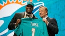 CHICAGO, IL - APRIL 28:  (L-R) Laremy Tunsil of Ole Miss holds up a jersey with NFL Commissioner Roger Goodell after being picked #13 overall by the Miami Dolphins during the first round of the 2016 NFL Draft at the Auditorium Theatre of Roosevelt University on April 28, 2016 in Chicago, Illinois. 