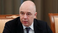 Russia threatens legal action if forced into sovereign debt default