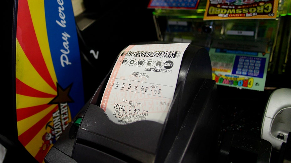A Powerball lottery ticket sits in the machine at the 4 Sons Food Store and Chevron gas station which sold one of two winning Powerball lottery tickets in Fountain Hills, Arizona Nov. 29, 2012. REUTERS/Joshua Lott