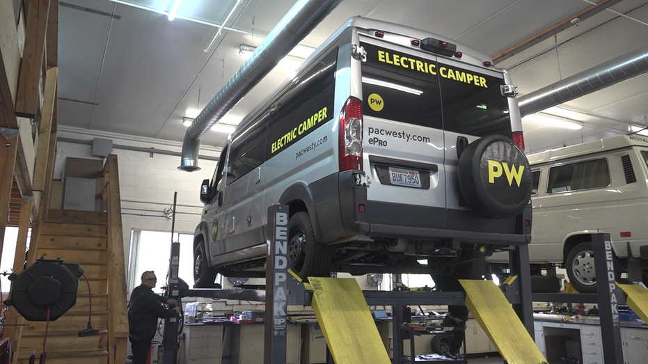 Washington auto staff working on finishing an electric camper for order