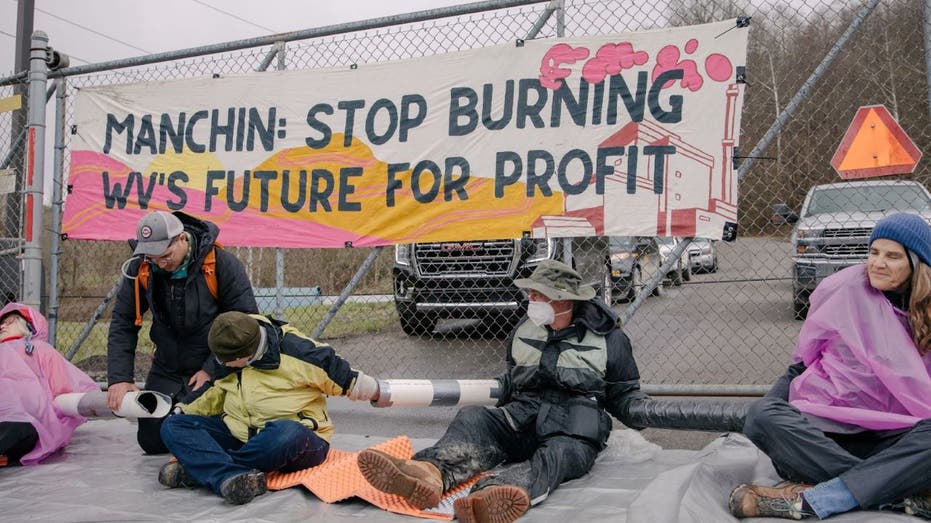 Climate activists protest Joe Manchin at West Virginia power plant