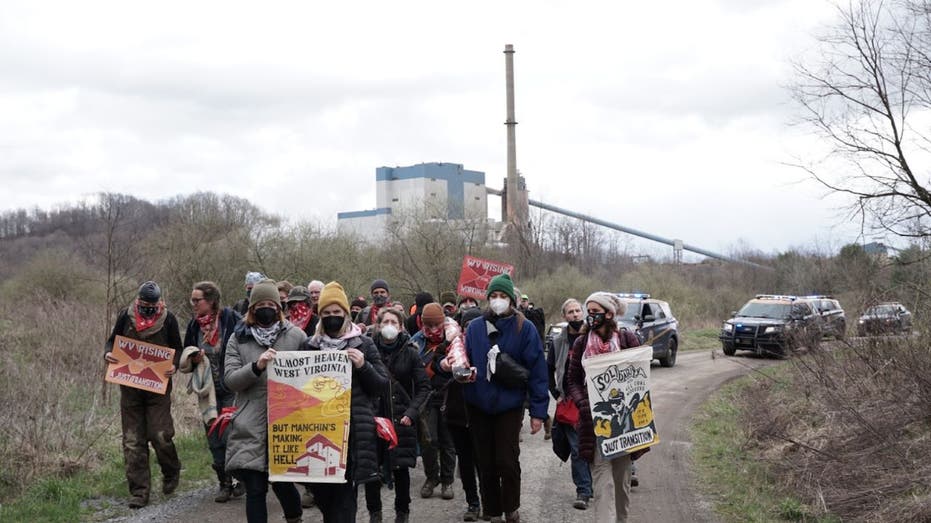 Climate activists protest Joe Manchin at West Virginia power plant