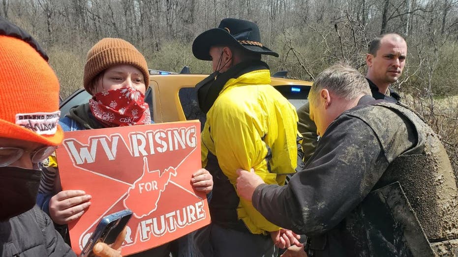 Climate activists protest Joe Manchin at West Virginia power plant
