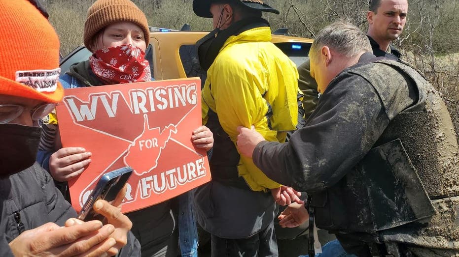 Climate activists protest Joe Manchin at West Virginia power plant