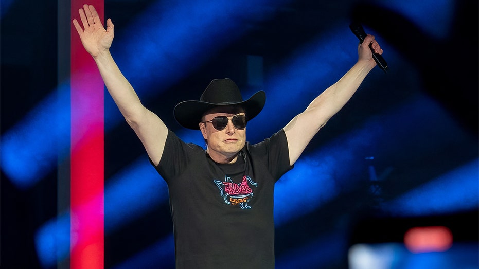 CEO of Tesla Motors Elon Musk speaks at the Tesla Giga Texas manufacturing "Cyber ​​Rodeo" grand opening party in Austin, Texas, on April 7, 2022. (Photo by SUZANNE CORDEIRO/AFP via Getty Images)