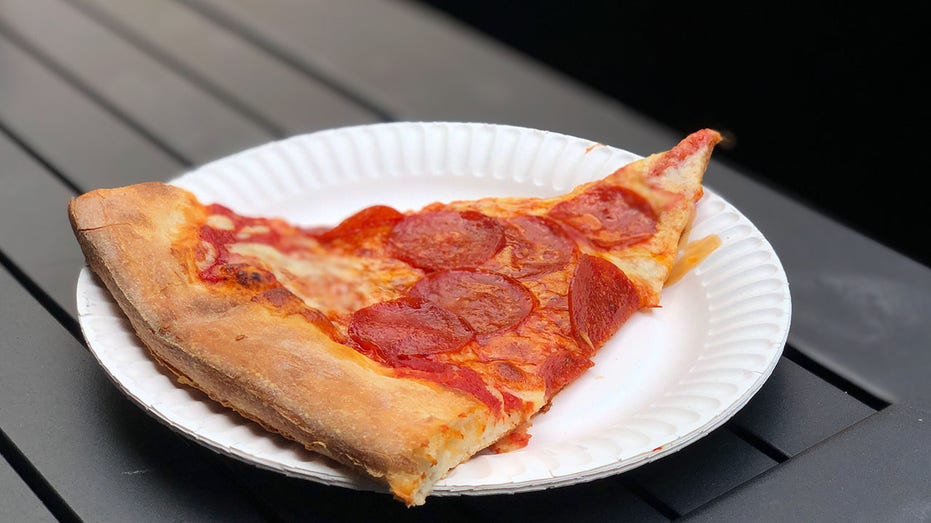 A pepperonic pizza slice