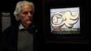 FILE PHOTO: A man walks past artwork titled &apos;Femme nue couchee&rsquo;, by Pablo Picasso during a media preview for Sotheby&apos;s spring contemporary and modern art sales auction in New York City, U.S., May 6, 2022. REUTERS/Shannon Stapleton/File Photo