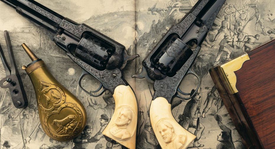 The two Ulysses S. Grant revolvers feature engravings and carved grip portraits of the American hero.