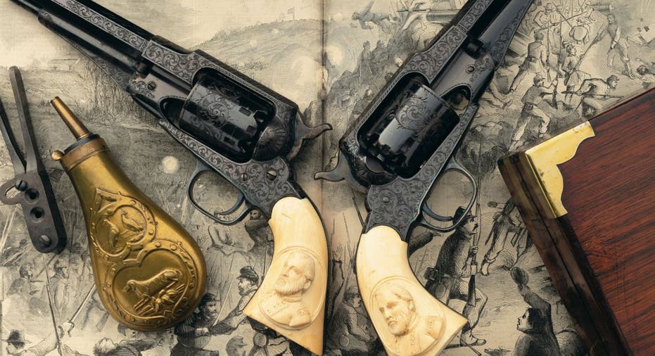 The two Ulysses S. Grant revolvers feature engravings and carved grip portraits of the American hero.