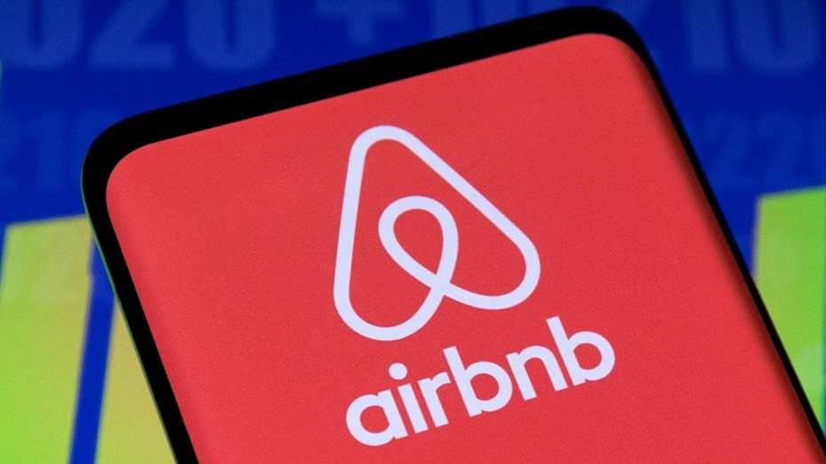Airbnb logo on a tablet