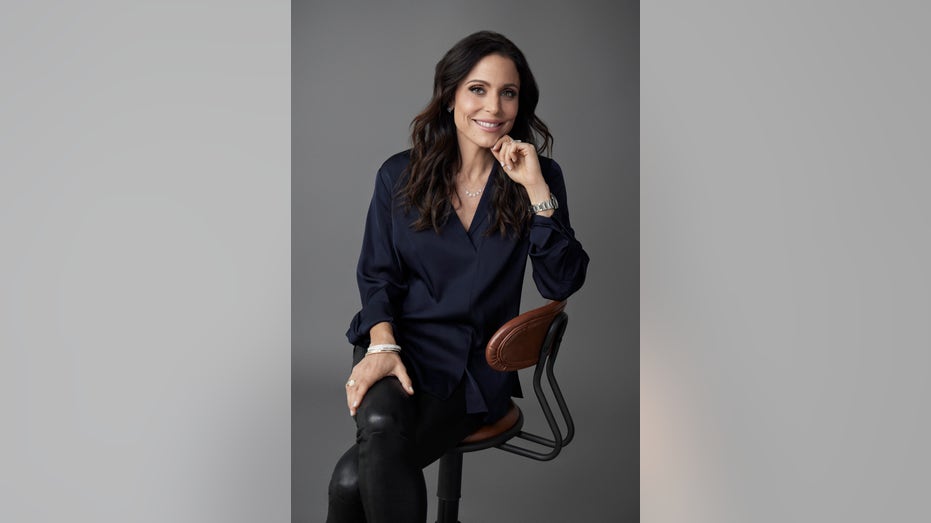 Bethenny Frankel in seated pose