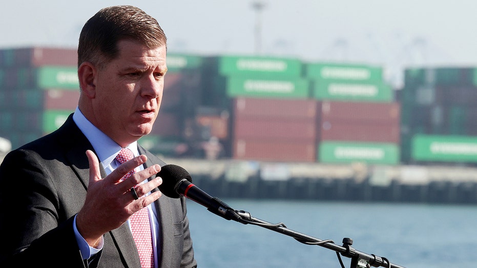 US Secretary of Labor Marty Walsh speaks at a press conference after touring the Port of Los Angeles