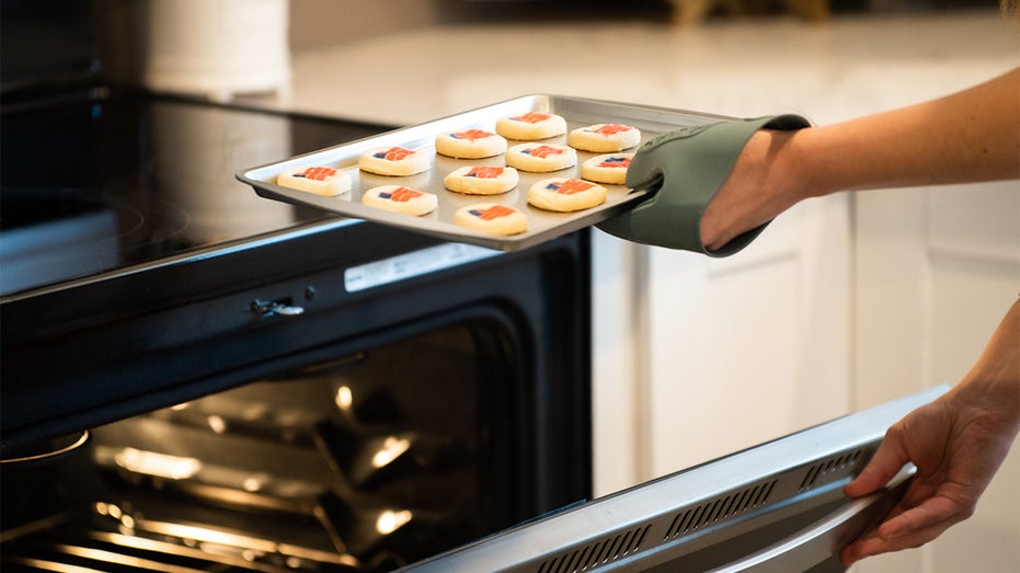 coookies going into an oven