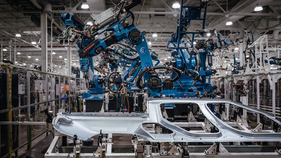 A robot assembling a car