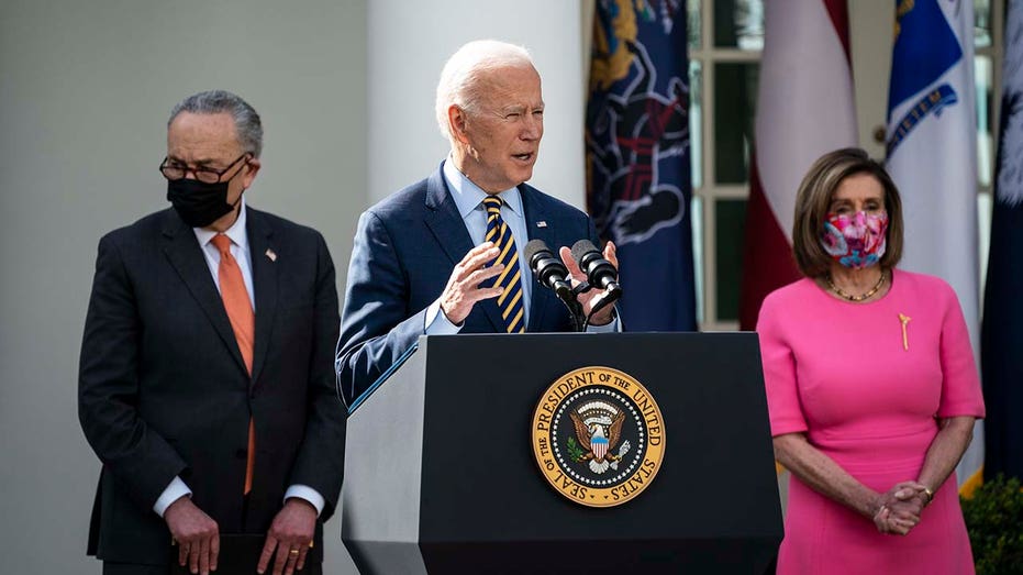 Biden, Schumer and Pelosi at an event