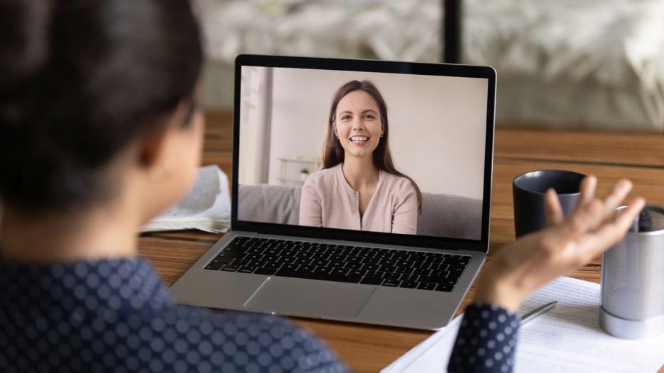 Women talk during video call