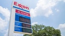 Gas prices are seen on an Exxon Mobil gas station sign on June 09, 2022 in Houston, Texas. 