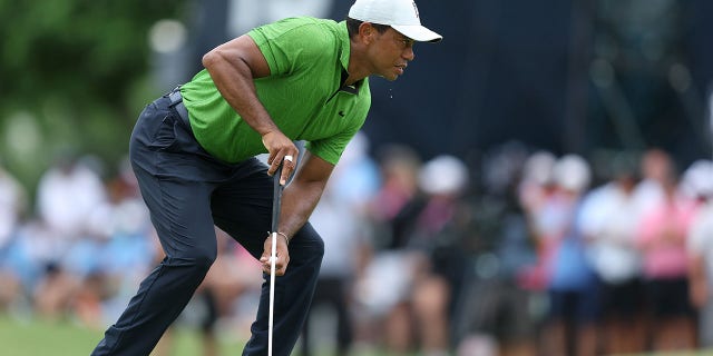 Tiger Woods eyes a shot during the second round of the 2022 PGA Championship at Southern Hills Country Club in Tulsa, Oklahoma, on May 20, 2022.
