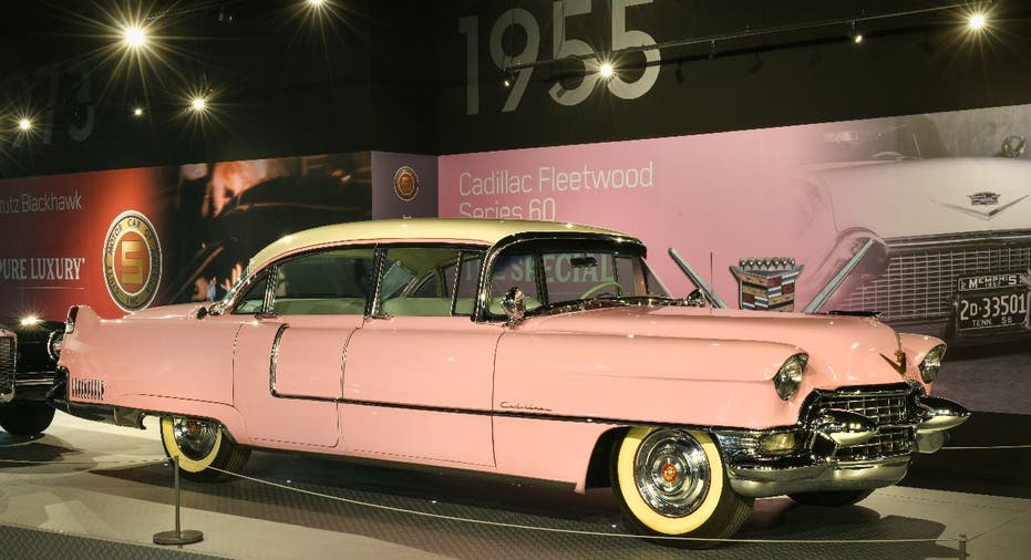 Pink and white Cadillac on display